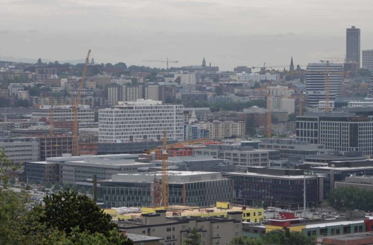 In the South Lake Union area of Seattle around Amazon, cranes fill the sky